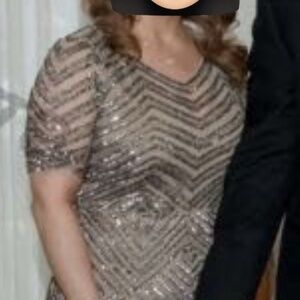 Taupe / cream like color with sleeves sequin detail throughout